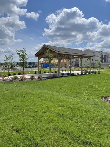 a view of a yard in front of a house
