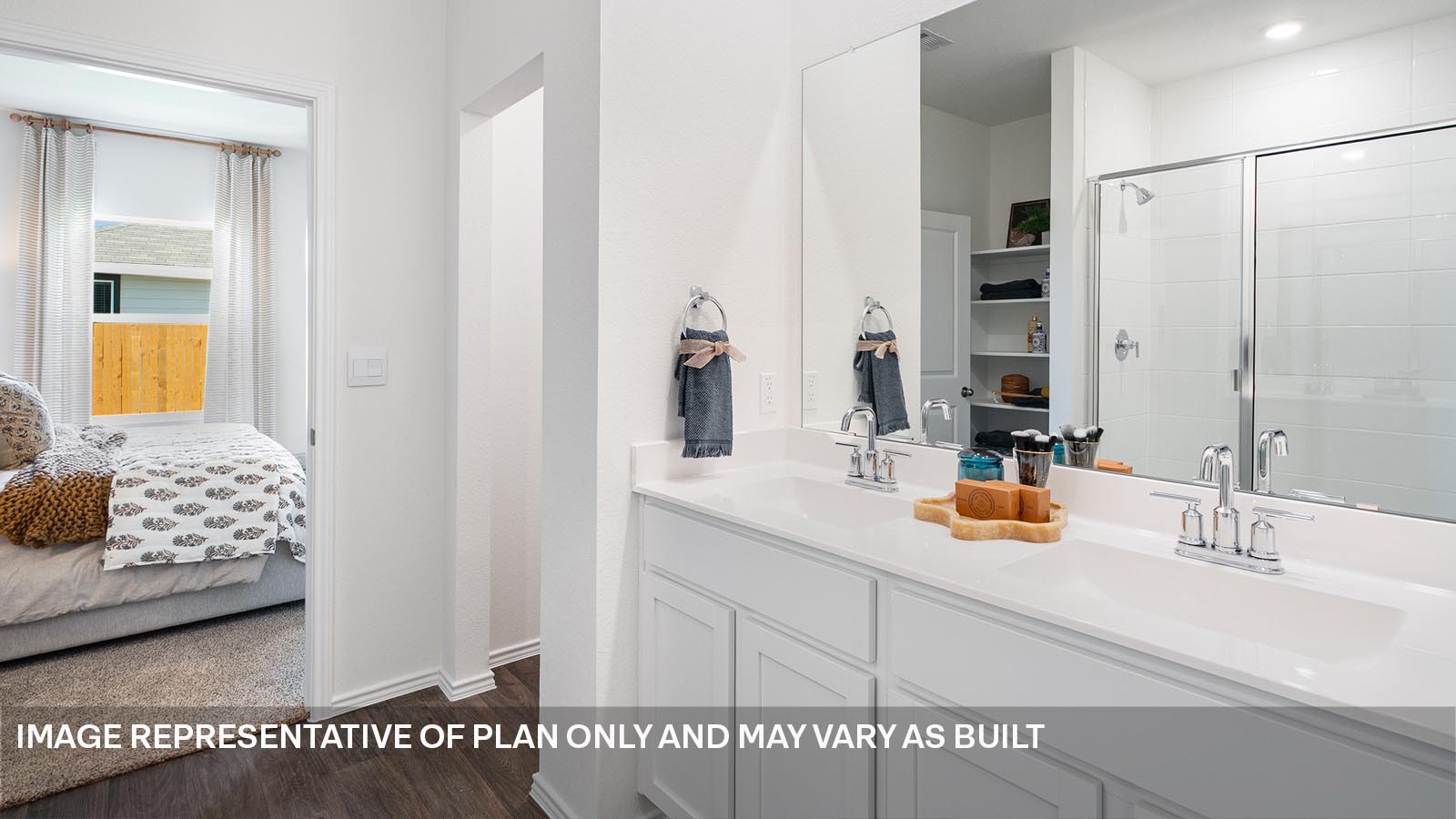 174 Balmorhea Street Kyle, TX 78640 - Photo 17 of 27 a bathroom with a sink and a mirror