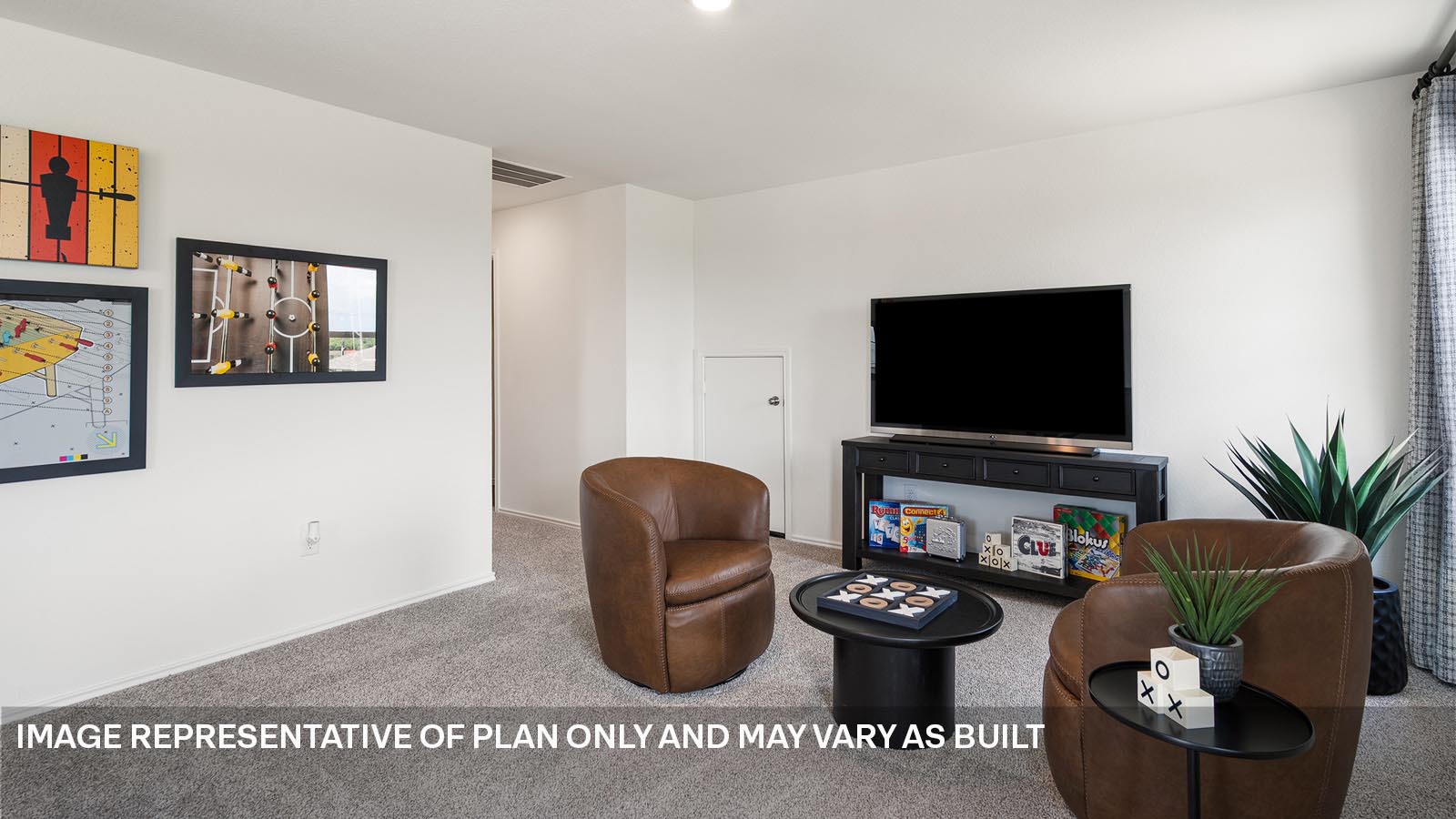 174 Balmorhea Street Kyle, TX 78640 - Photo 18 of 27 a living room with furniture and a flat screen tv