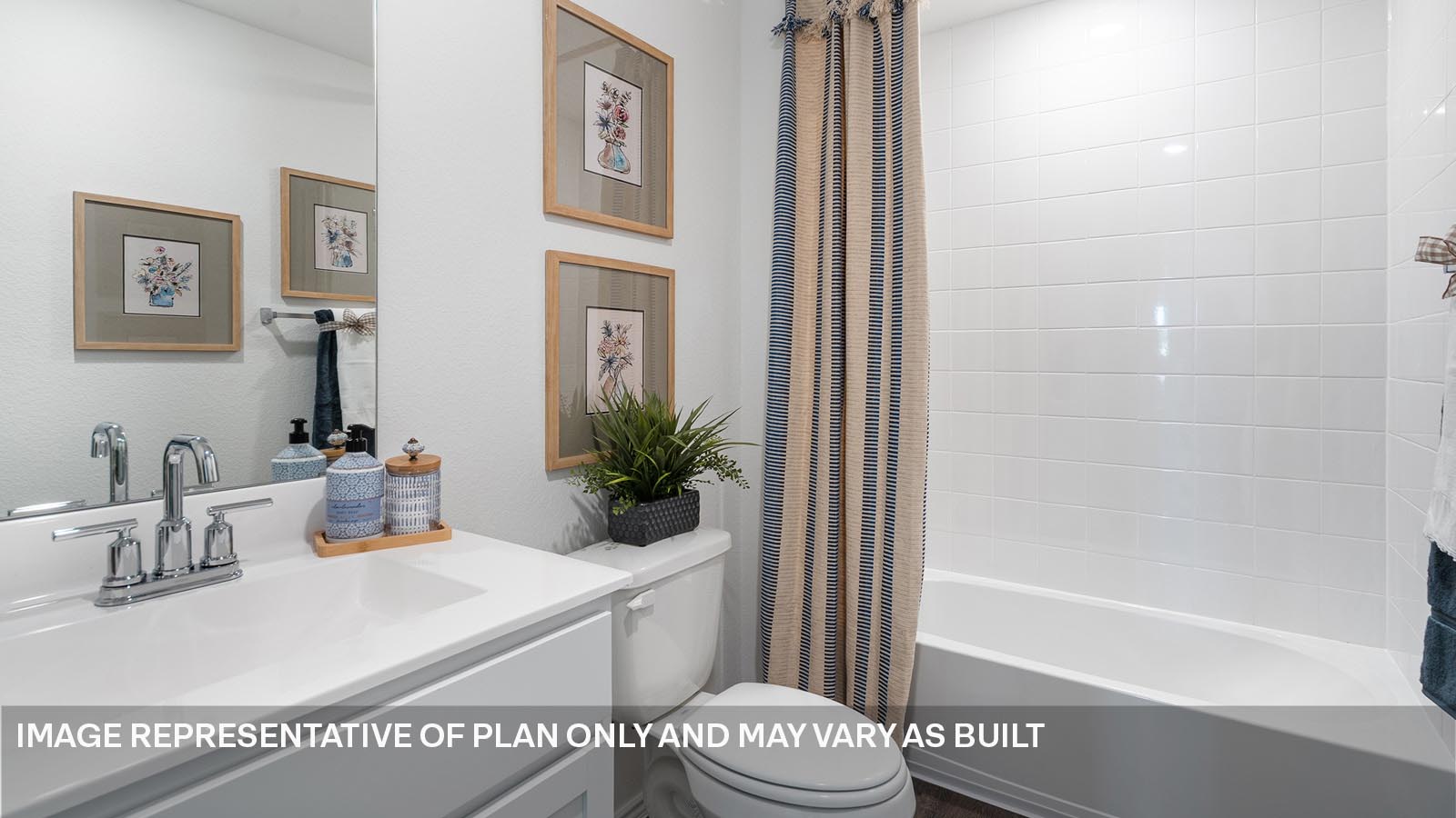 174 Balmorhea Street Kyle, TX 78640 - Photo 22 of 27 a bathroom with a sink a toilet a mirror and shower