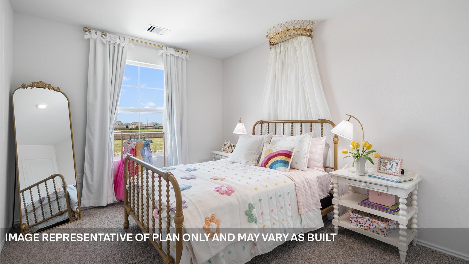 174 Balmorhea Street Kyle, TX 78640 - Photo 24 of 27 a bedroom with a bed and a window