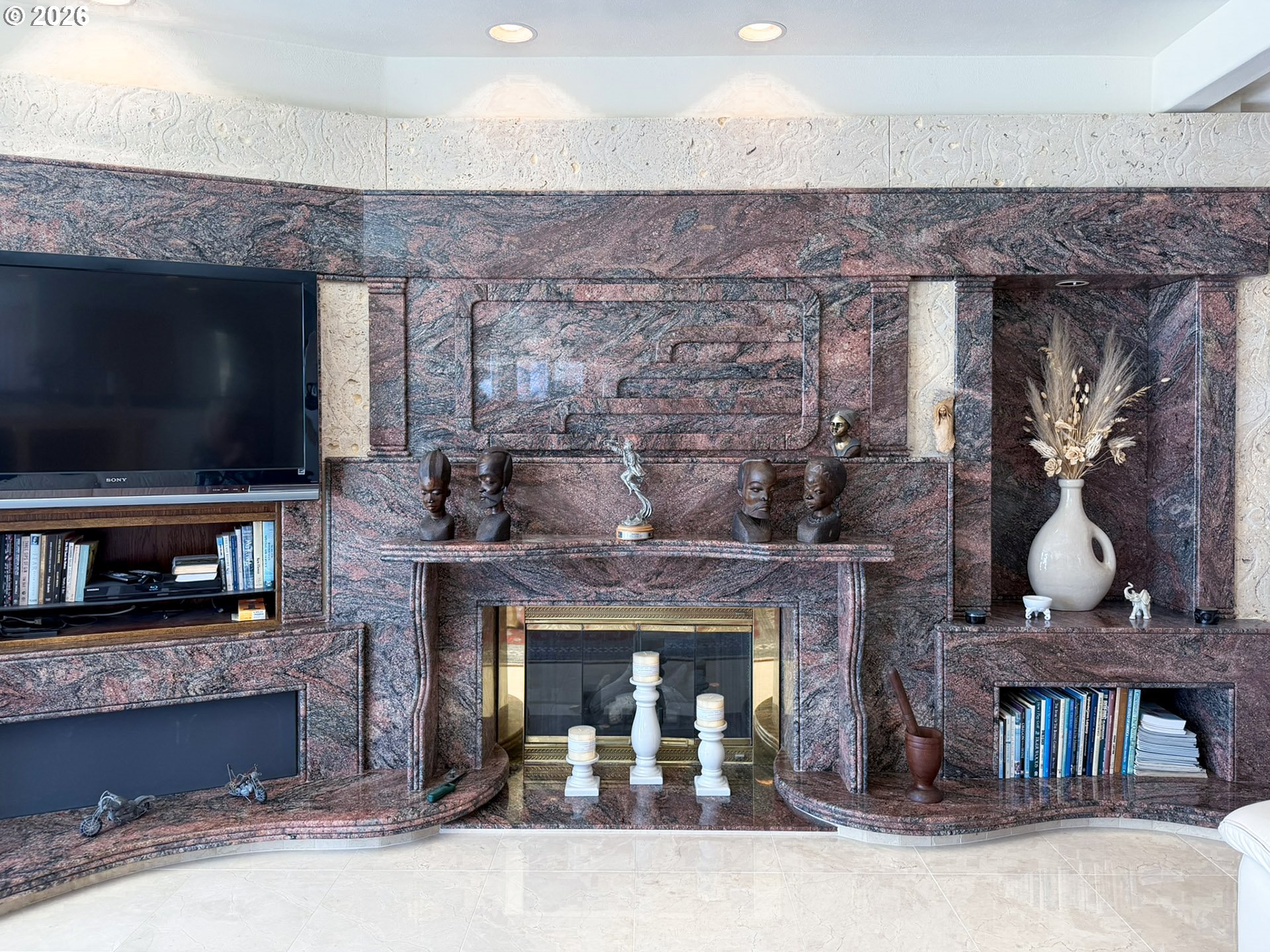 98696 Fox Drive Brookings, OR 97415 - Photo 11 of 48 a living room with furniture a flat screen tv and a fireplace