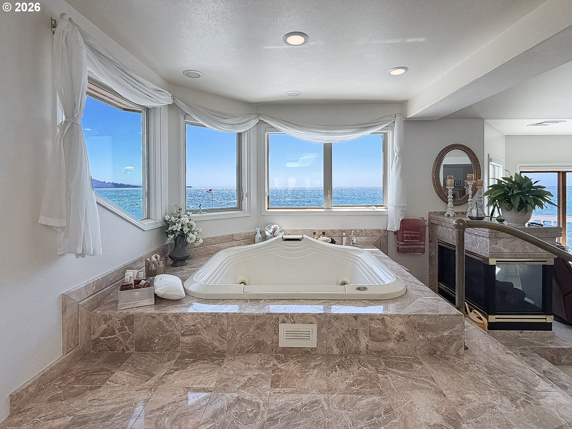 98696 Fox Drive Brookings, OR 97415 - Photo 23 of 48 a bath tub sitting in a bathroom next to a sink