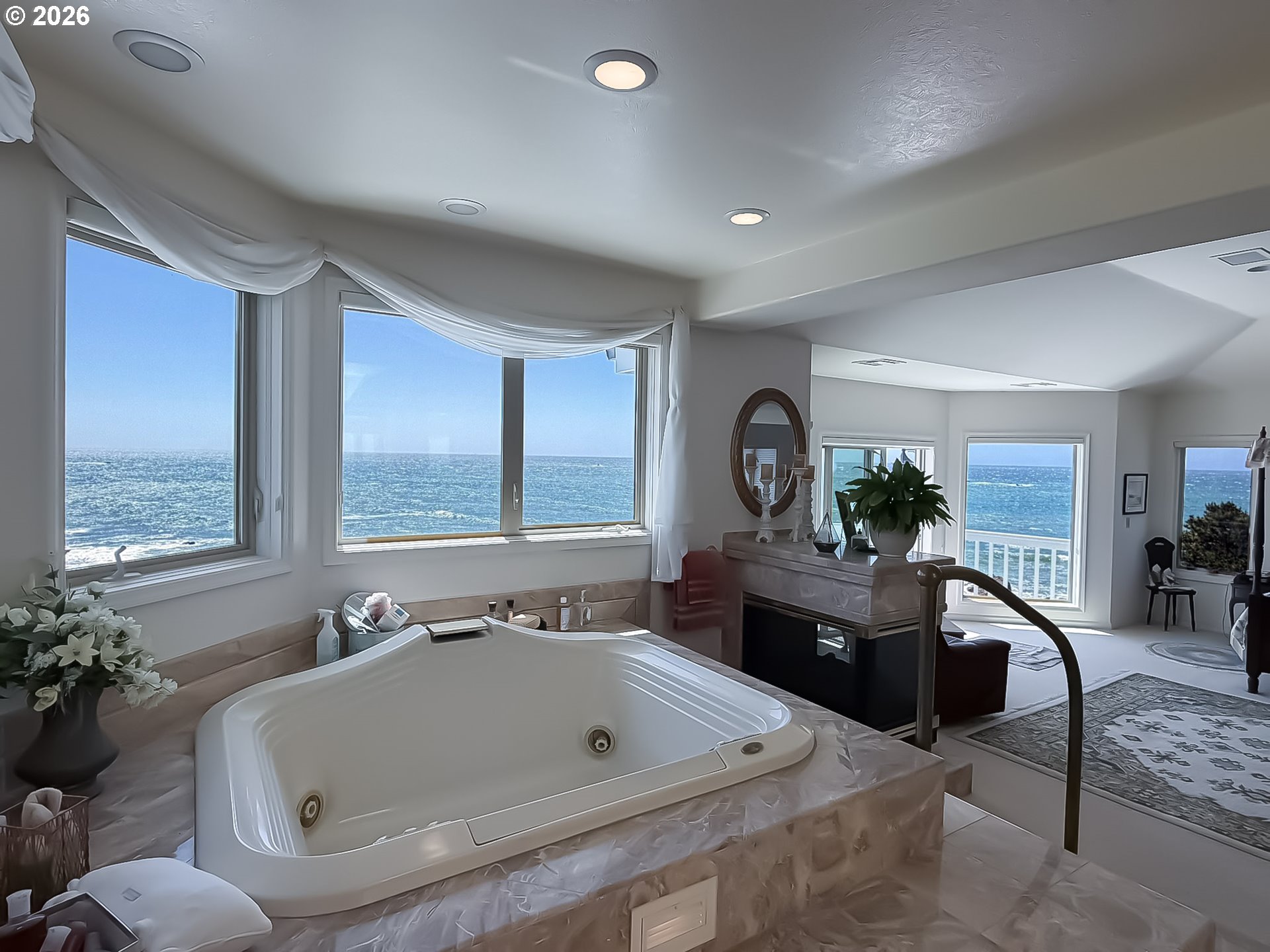 98696 Fox Drive Brookings, OR 97415 - Photo 27 of 48 a bathroom with a tub a potted plant and a sink