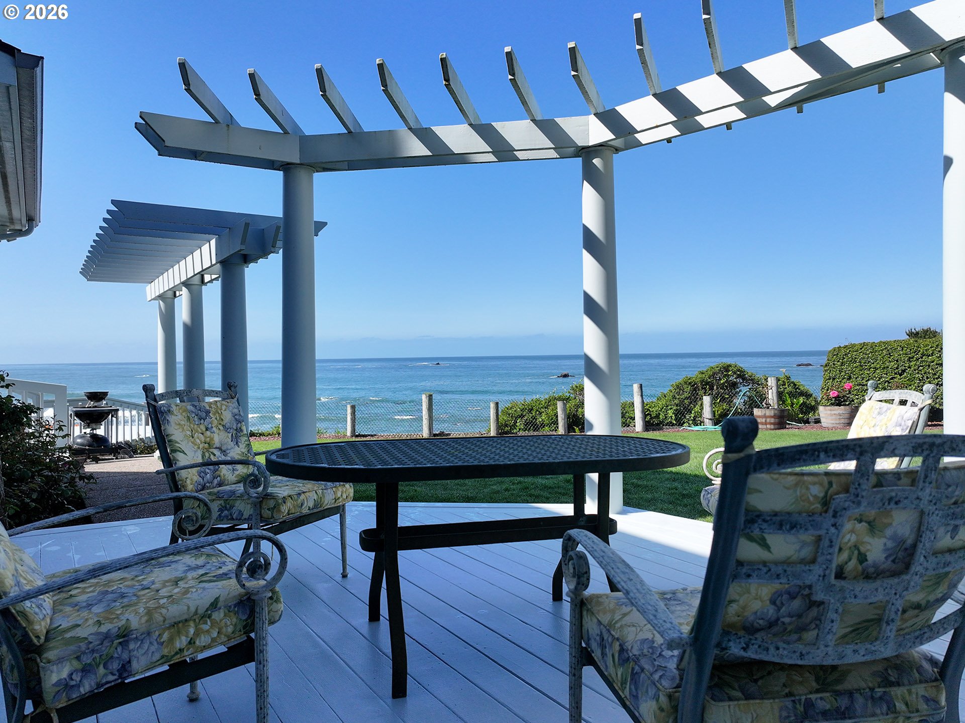 98696 Fox Drive Brookings, OR 97415 - Photo 39 of 48 a view of a chairs and table in a patio