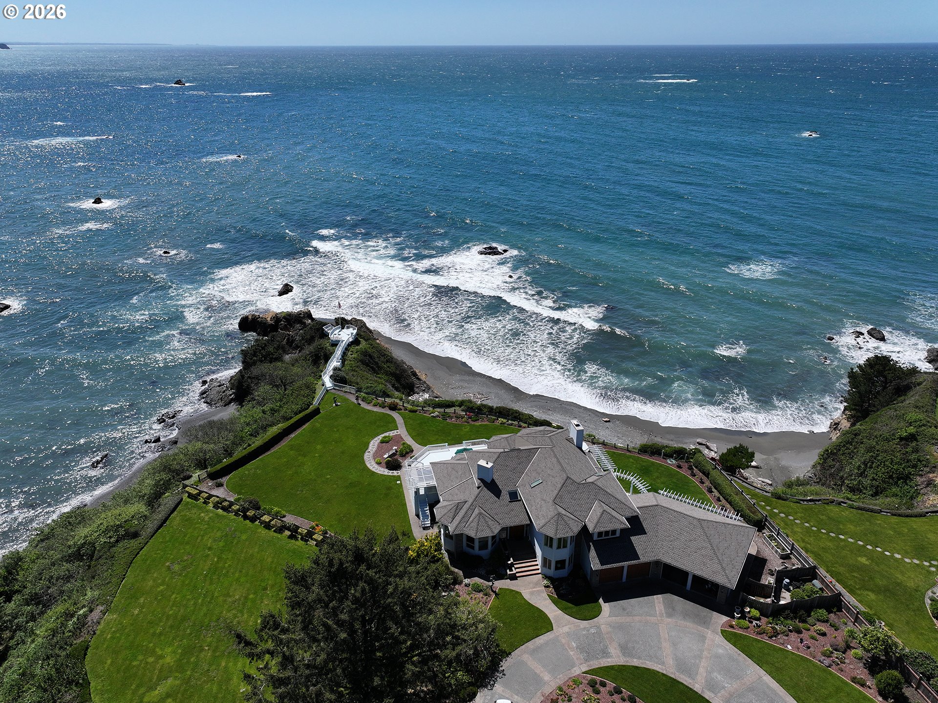 98696 Fox Drive Brookings, OR 97415 - Photo 48 of 48 an aerial view of a house with a garden