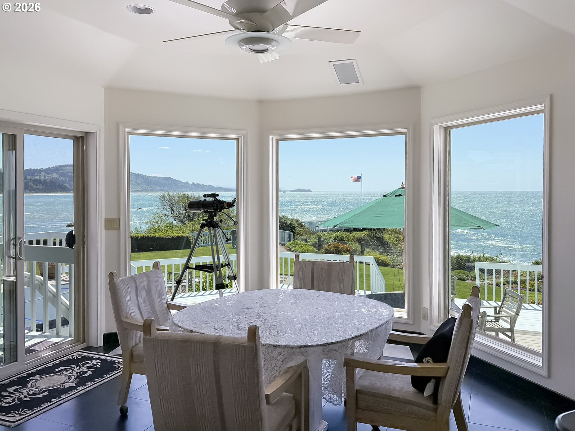 98696 Fox Drive Brookings, OR 97415 - Photo 9 of 48 a view of a dining room with furniture window and outside view