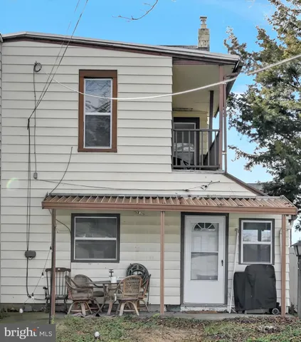 a view of house with outdoor space