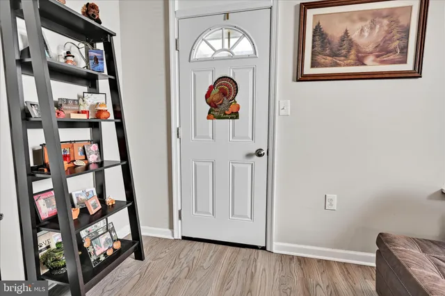 a view of a hallway with shelves