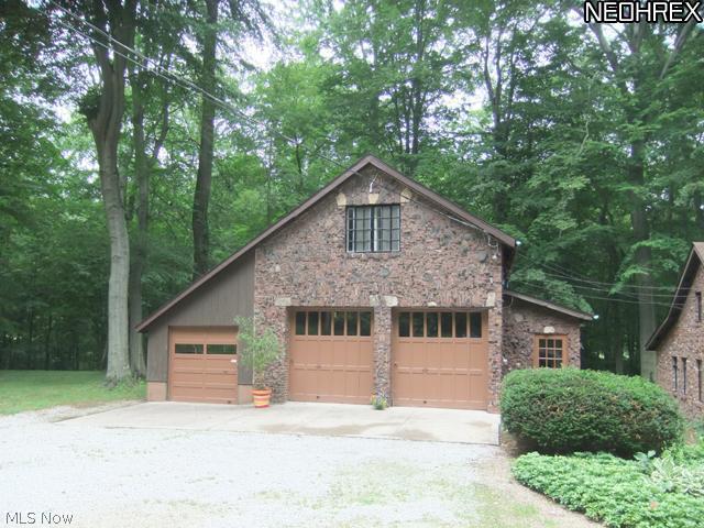 1130 South Hametown Road Akron, OH 44321 - Photo 14 of 24 Three car garage features additional living space above.