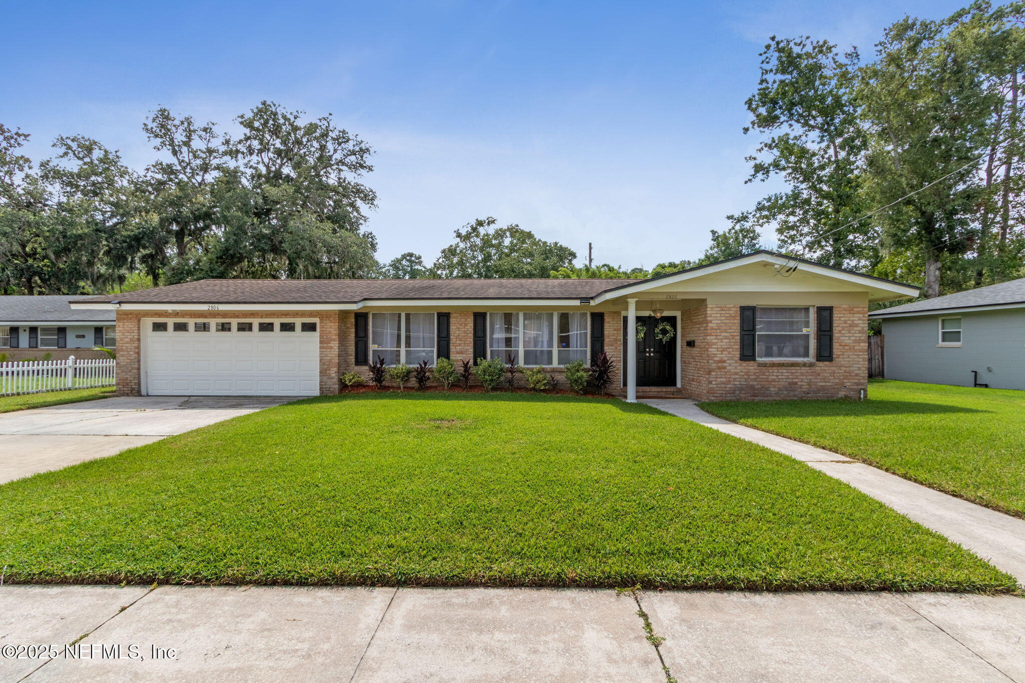 2806 Annette Circle Jacksonville, FL 32216 - Photo 1 of 31 a view of a house with a yard and a tree