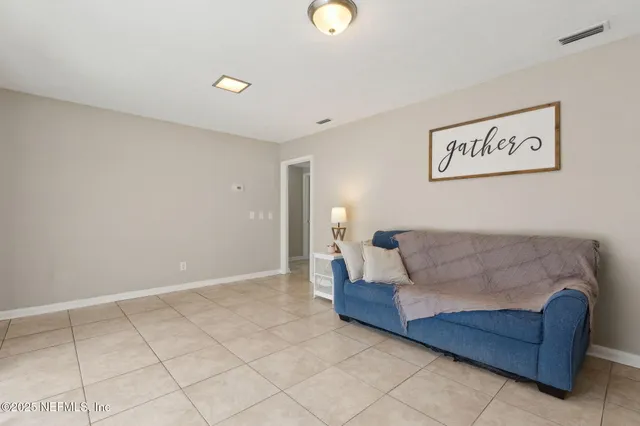 a living room with furniture and a couch