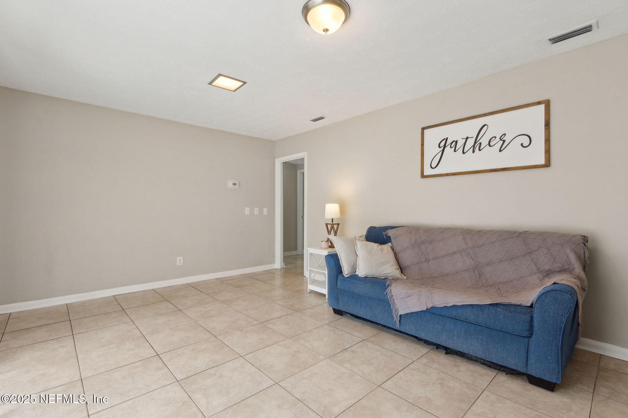 2806 Annette Circle Jacksonville, FL 32216 - Photo 17 of 31 a living room with furniture and a couch