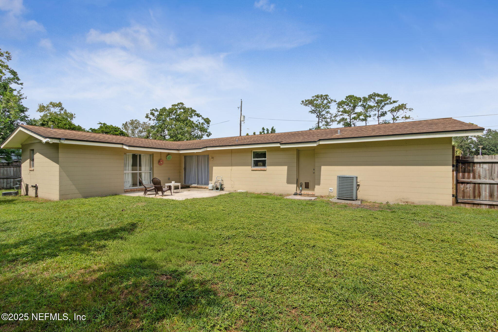 2806 Annette Circle Jacksonville, FL 32216 - Photo 31 of 31 a view of a house with a back yard