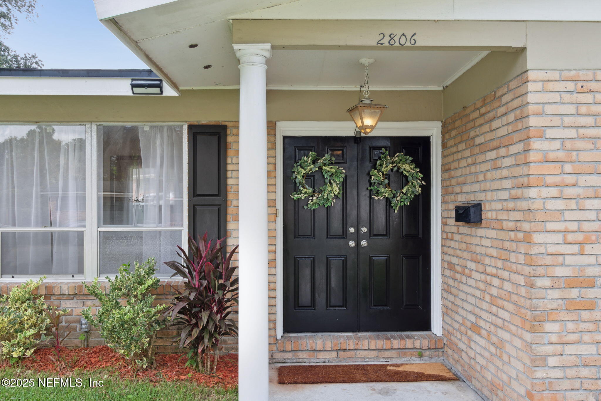 2806 Annette Circle Jacksonville, FL 32216 - Photo 4 of 31 a view of a entryway door front of house