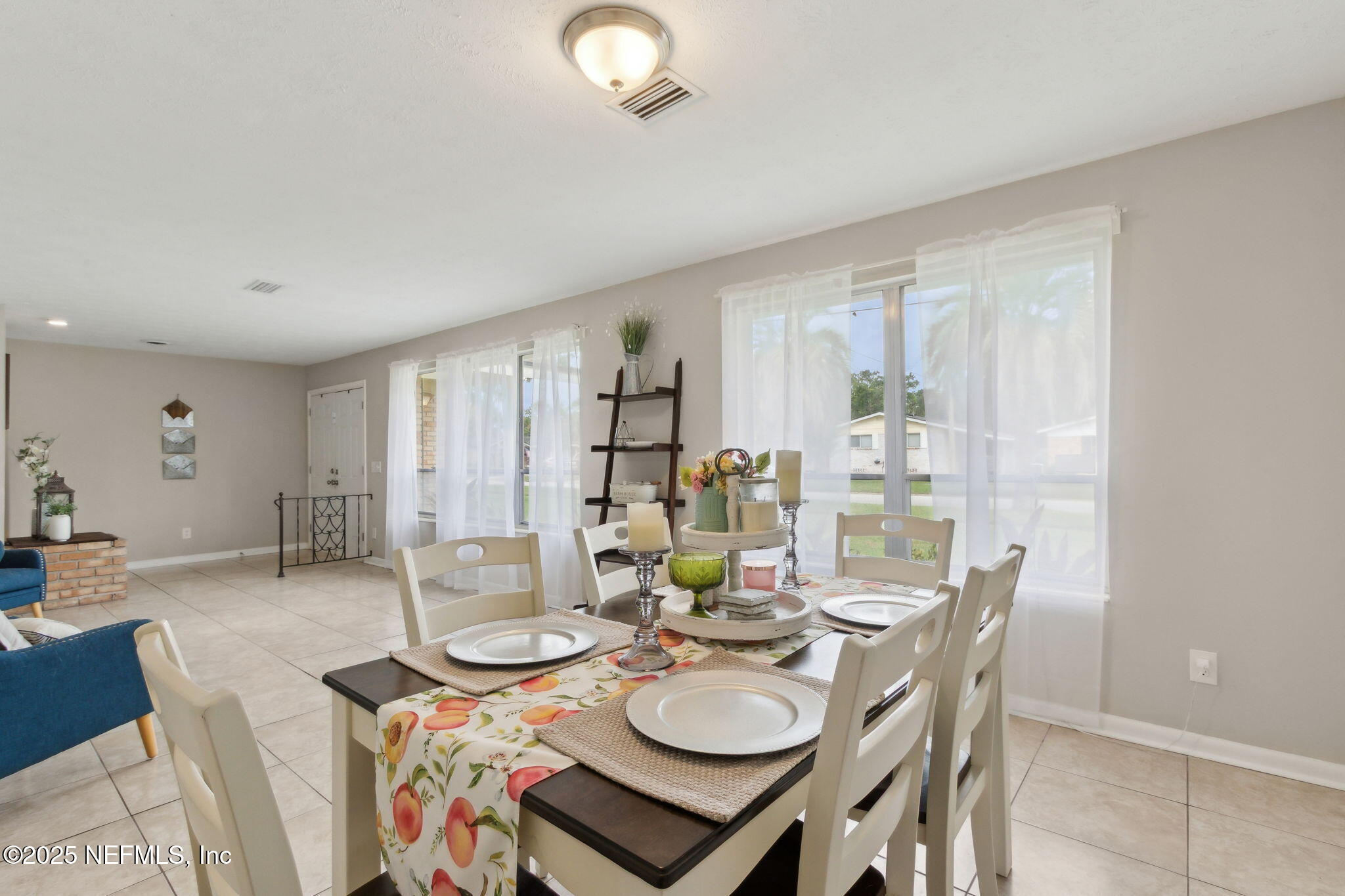 2806 Annette Circle Jacksonville, FL 32216 - Photo 8 of 31 a view of a dining room with furniture and wooden floor