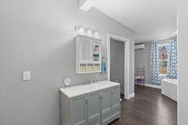 a bathroom with a bathtub and shower curtain