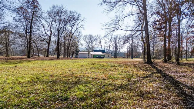 a view of swimming pool with an outdoor space and seating area