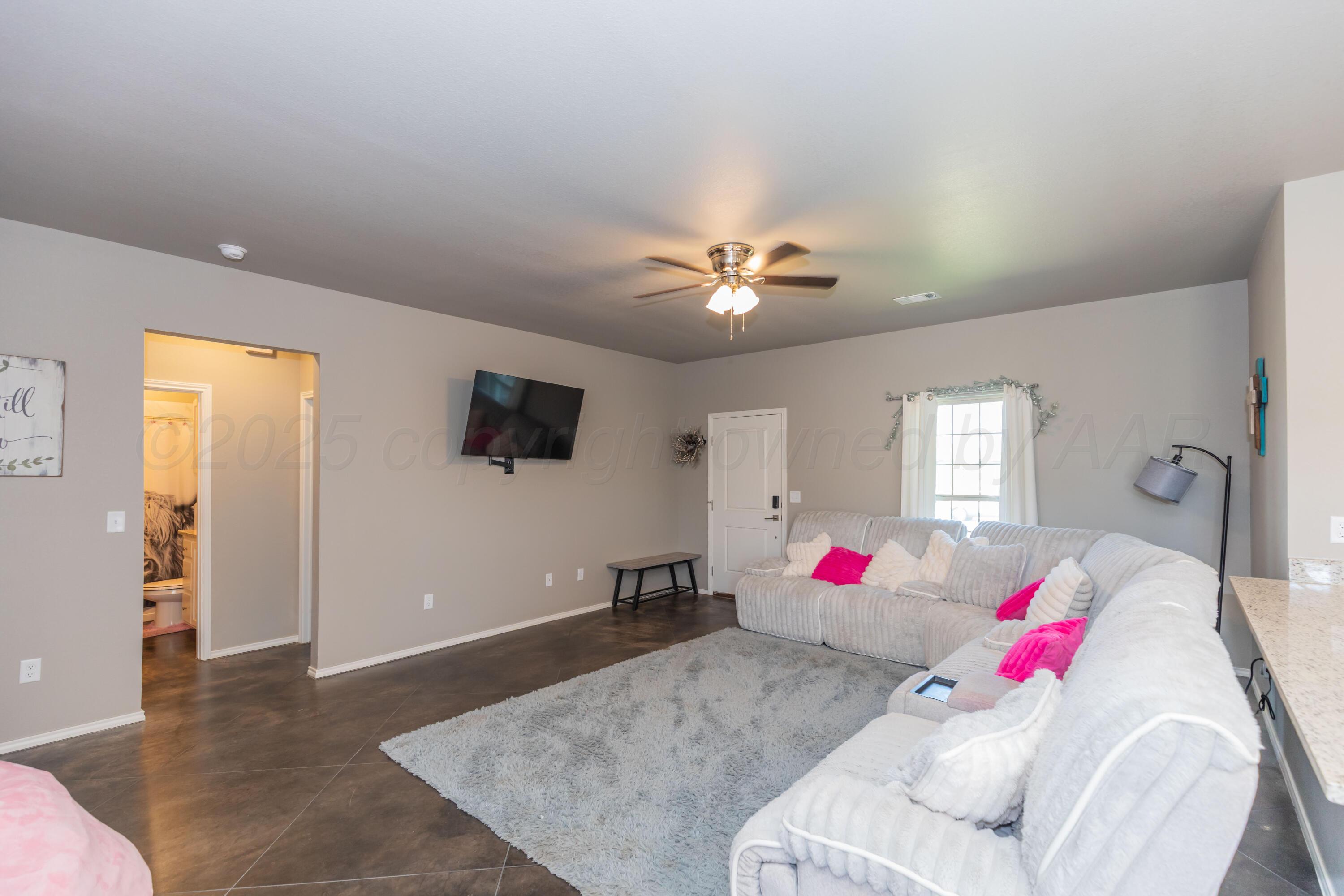 5007 Ratliff Street Amarillo, TX 79118 - Photo 4 of 36 LIVING ROOM VIEW 1