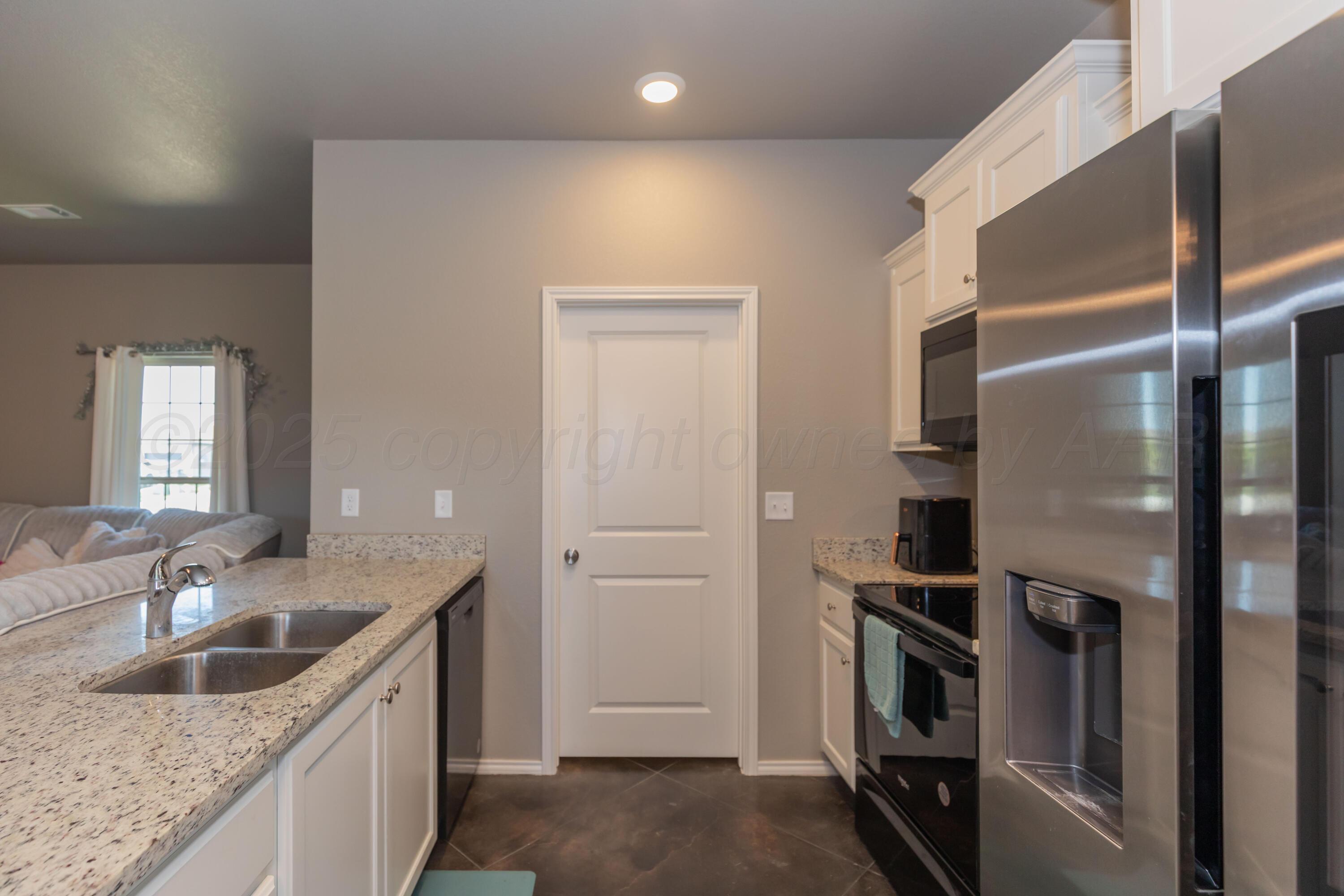 5007 Ratliff Street Amarillo, TX 79118 - Photo 8 of 36 KITCHEN VIEW 1