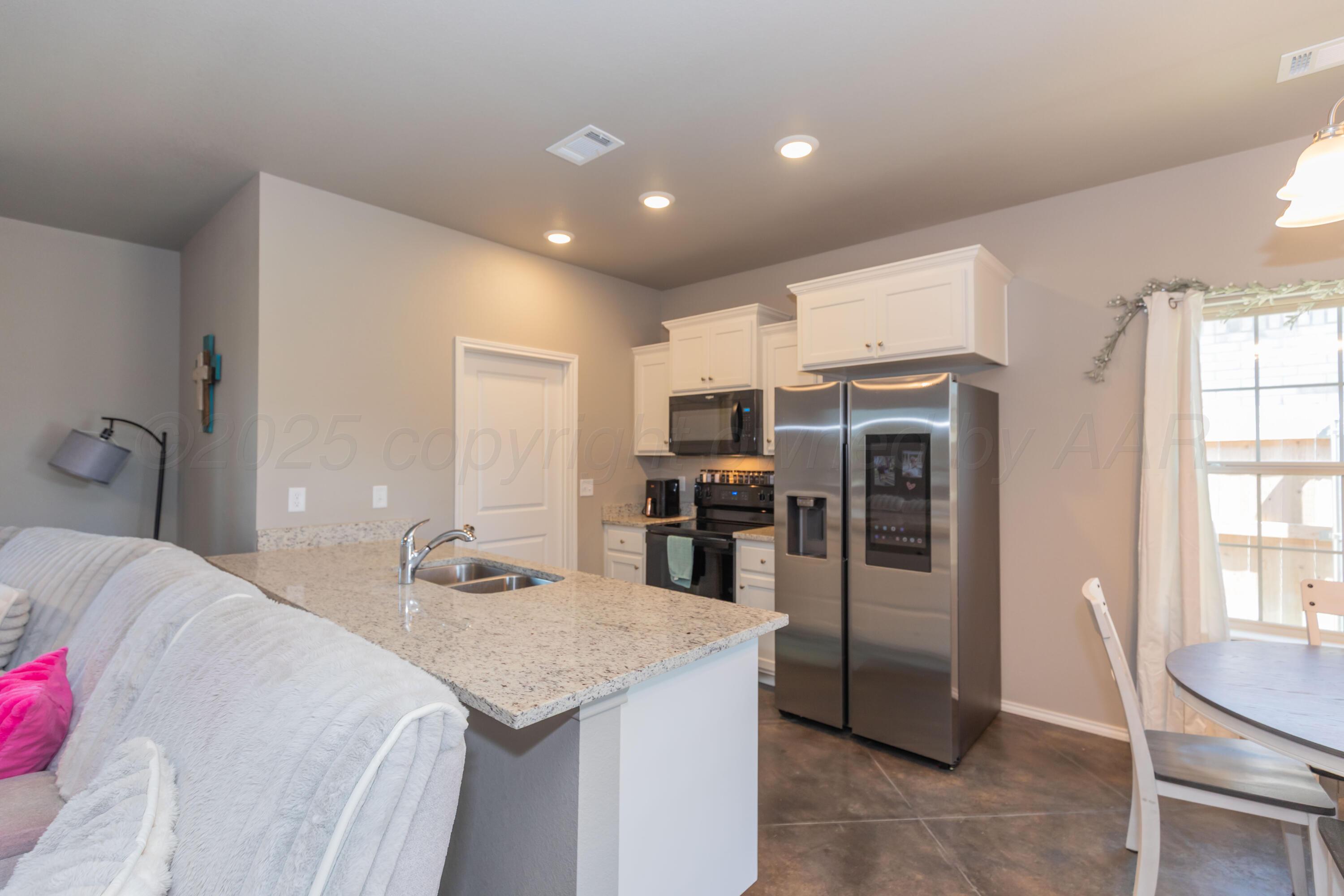 5007 Ratliff Street Amarillo, TX 79118 - Photo 10 of 36 KITCHEN VIEW 3
