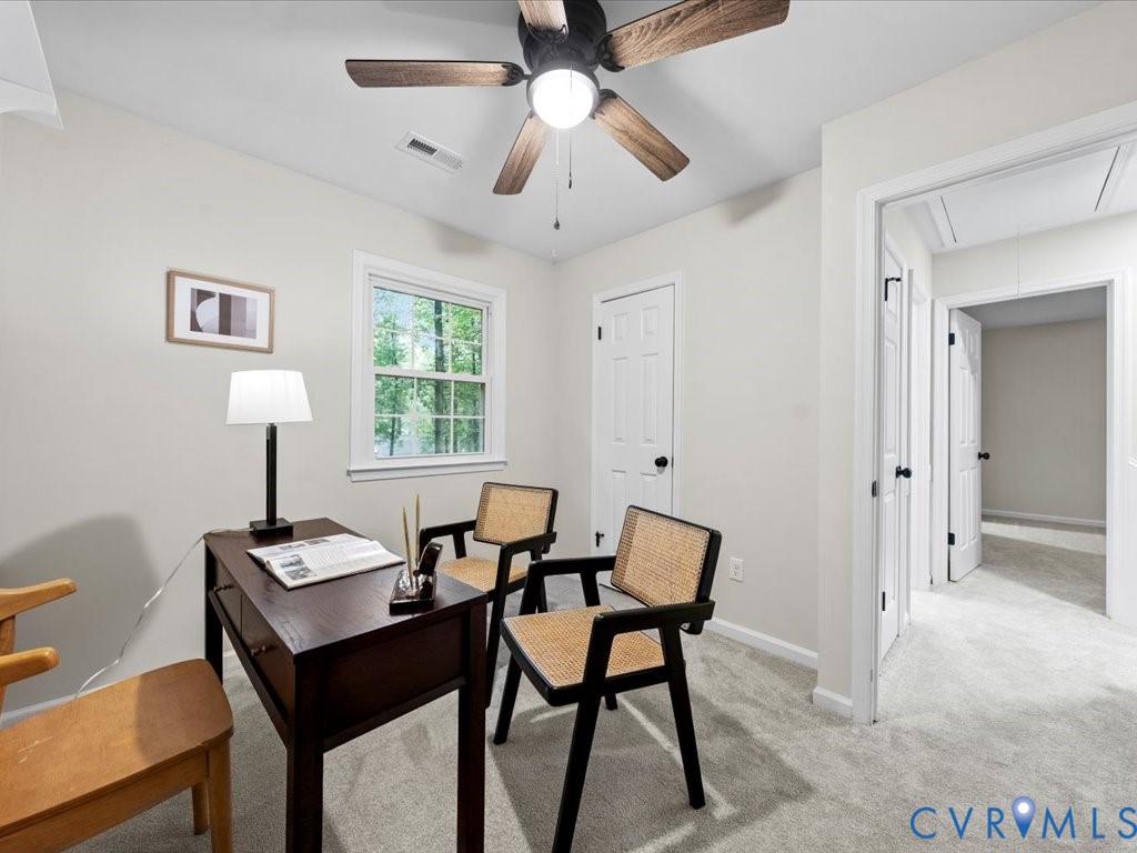 12130 Quito Road Midlothian, VA 23112 - Photo 28 of 41 a view of a workspace with furniture and a window