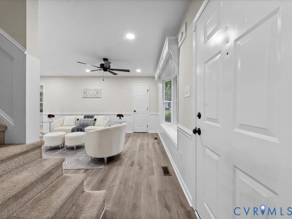 12130 Quito Road Midlothian, VA 23112 - Photo 3 of 41 a view of an entryway with wooden floor