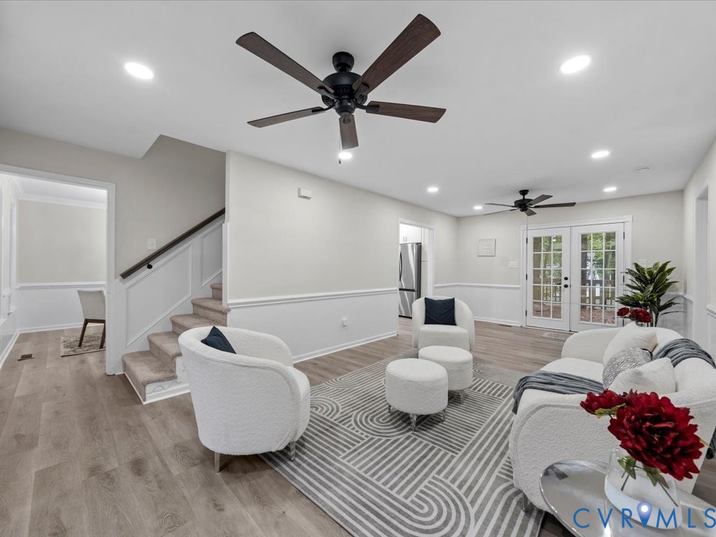 12130 Quito Road Midlothian, VA 23112 - Photo 4 of 41 a living room with furniture and a wooden floor