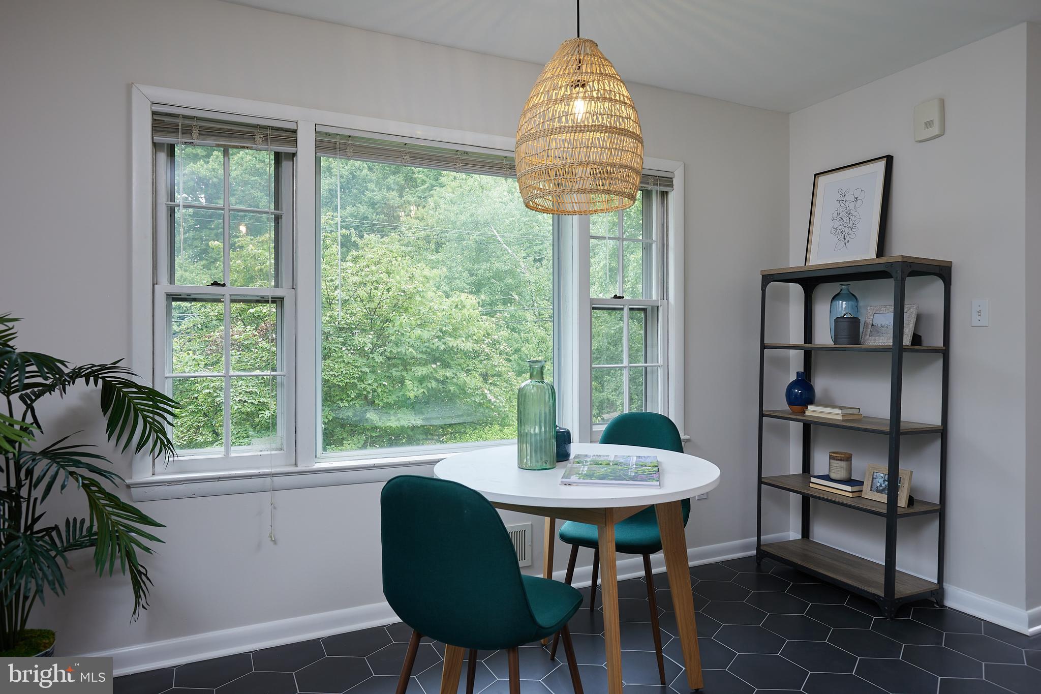 10611 Glenwild Road Silver Spring, MD 20901 - Photo 11 of 39 a table and chairs in a room
