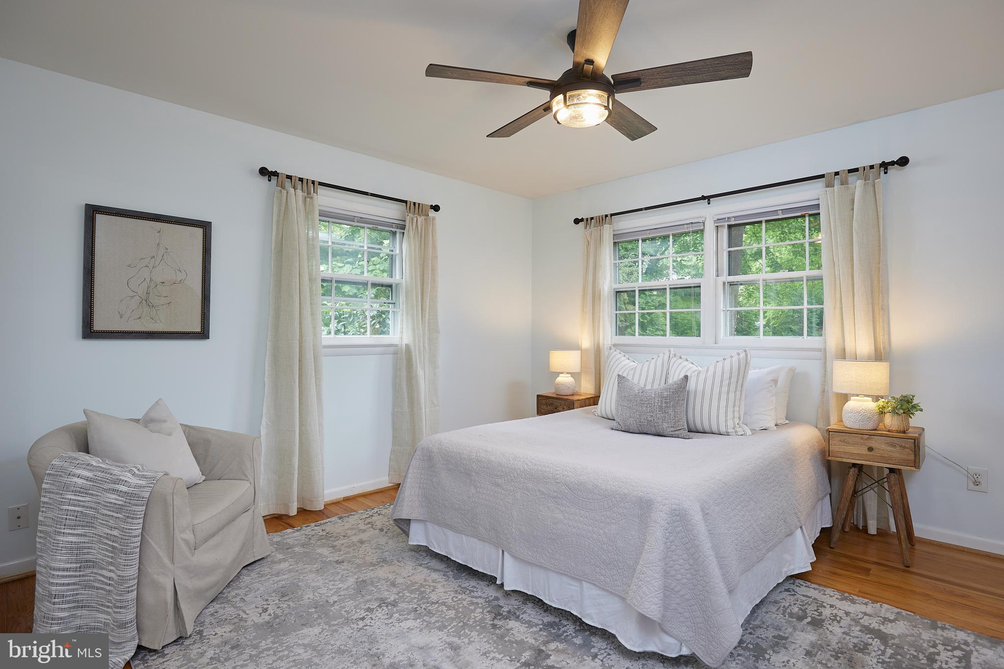 10611 Glenwild Road Silver Spring, MD 20901 - Photo 15 of 39 a bedroom with a bed couches and window