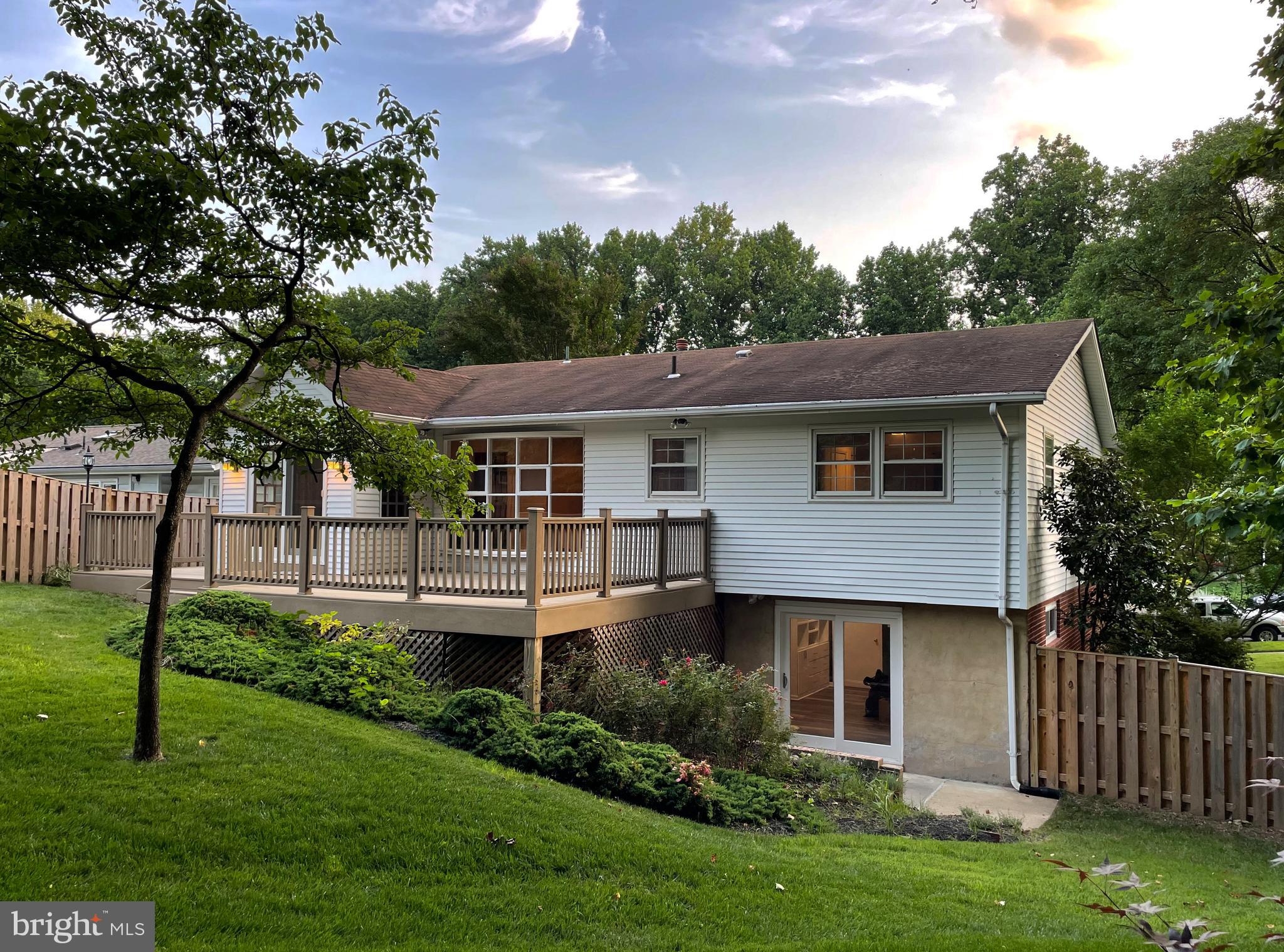 10611 Glenwild Road Silver Spring, MD 20901 - Photo 30 of 39 a front view of a house with a yard