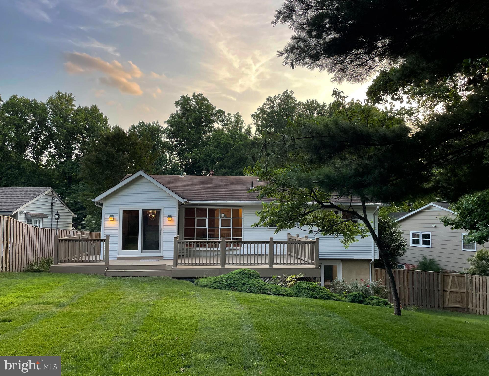 10611 Glenwild Road Silver Spring, MD 20901 - Photo 31 of 39 a front view of a house with a garden