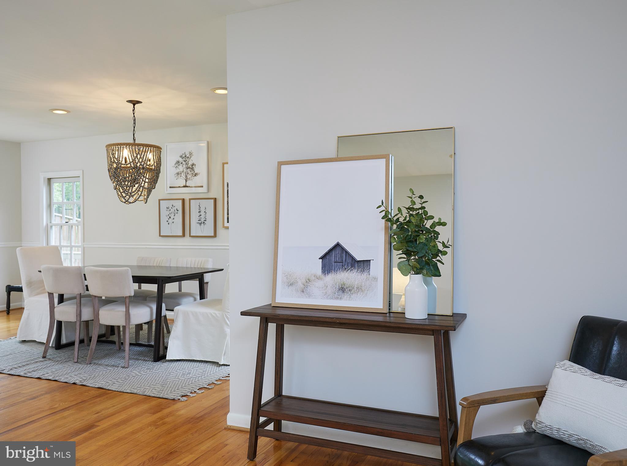 10611 Glenwild Road Silver Spring, MD 20901 - Photo 5 of 39 a living room with furniture and wooden floor