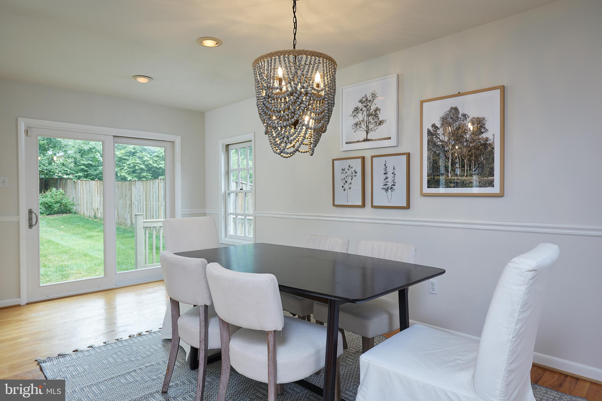 10611 Glenwild Road Silver Spring, MD 20901 - Photo 7 of 39 a view of a dining room with furniture window and outside view