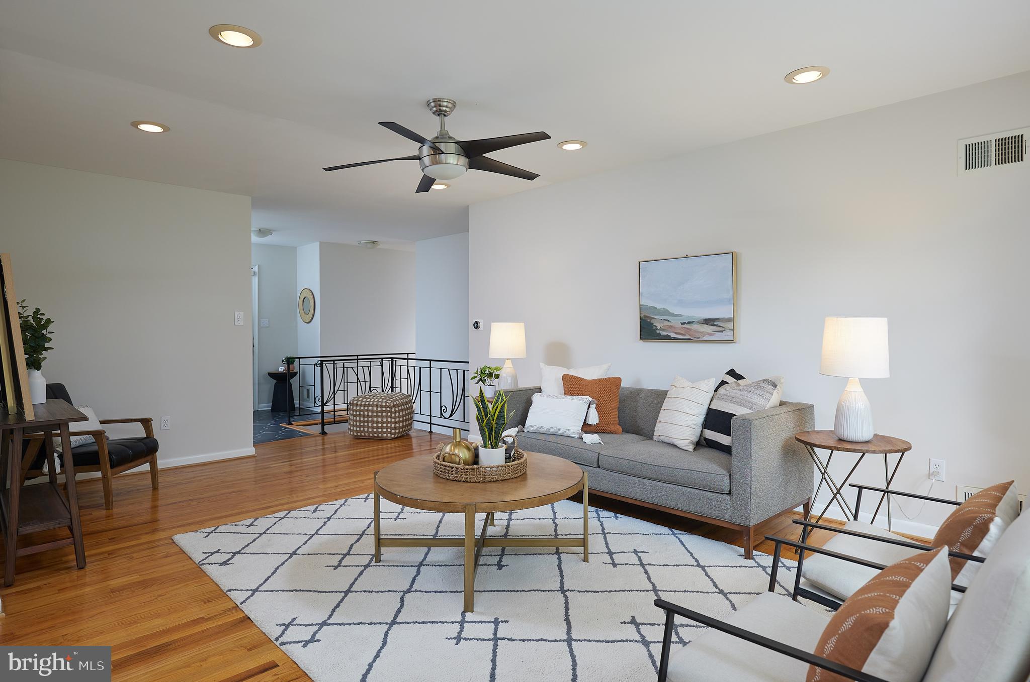 10611 Glenwild Road Silver Spring, MD 20901 - Photo 8 of 39 a living room with furniture