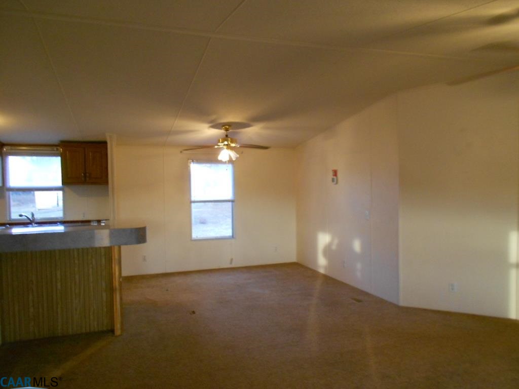 3135 Orange Road Aroda, VA 22709 - Photo 3 of 10 a view of empty room with a ceiling fan and window
