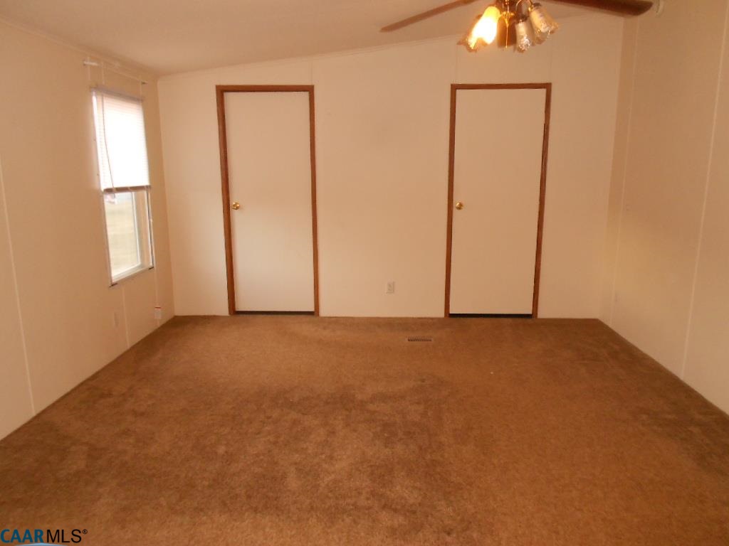 3135 Orange Road Aroda, VA 22709 - Photo 6 of 10 an empty room with windows and closet