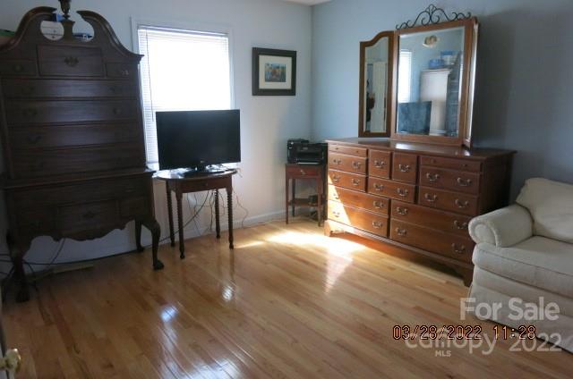 205 Towne Court Conover, NC 28613 - Photo 10 of 19 a living room with furniture and a flat screen tv