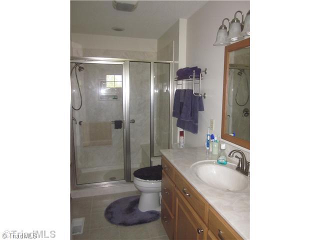 313 Cook Florist Road Reidsville, NC 27320 - Photo 13 of 16 Master Bath/Spa. Seller had old tub and shower removed and put in walk in shower. Seller replaced counter tops and cabinets.