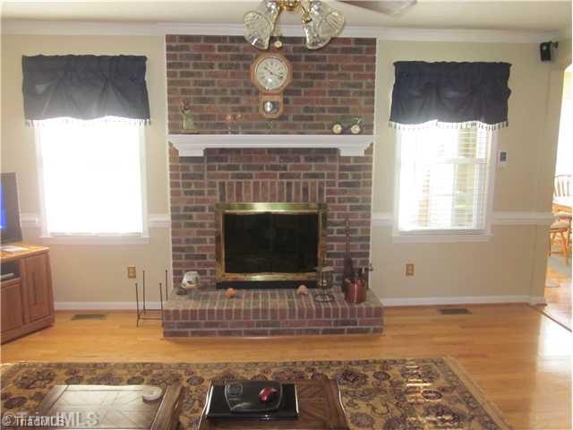 313 Cook Florist Road Reidsville, NC 27320 - Photo 8 of 16 Living Room. Masonary fireplace with gas logs.