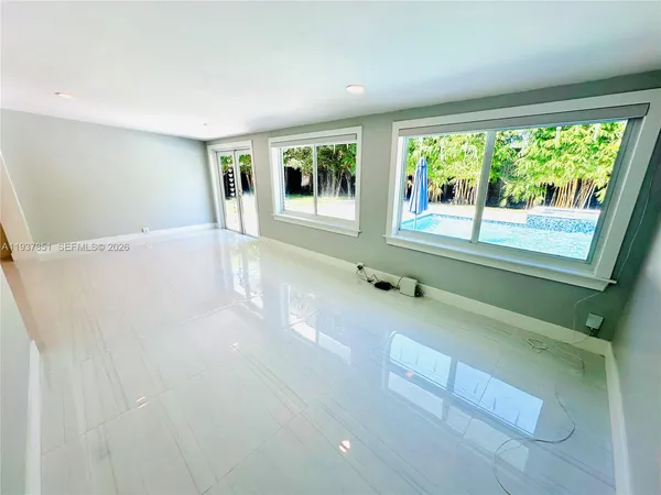 a view of a livingroom with a flat screen tv
