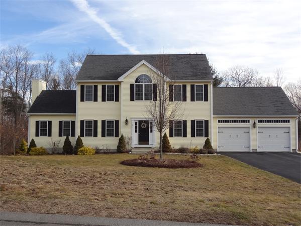 43 Quabbin Path Sutton, MA 01590 - Photo 2 of 29 a front view of a house with a yard