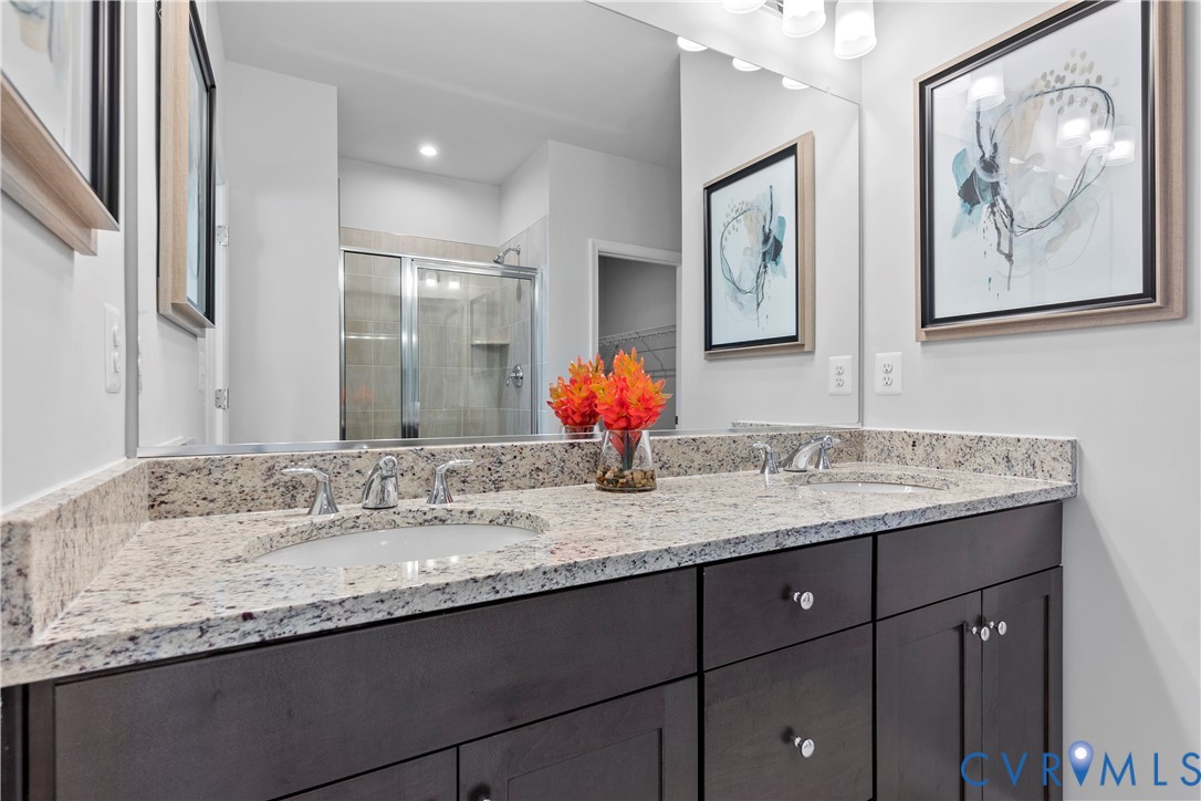 3611 Edna Path, Unit A Richmond, VA 23233 - Photo 18 of 32 a bathroom with a granite countertop double vanity sink and two mirror