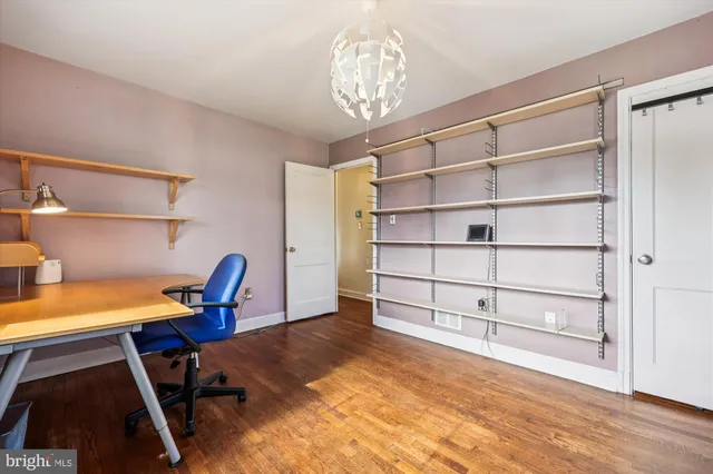 a view of a park with large trees