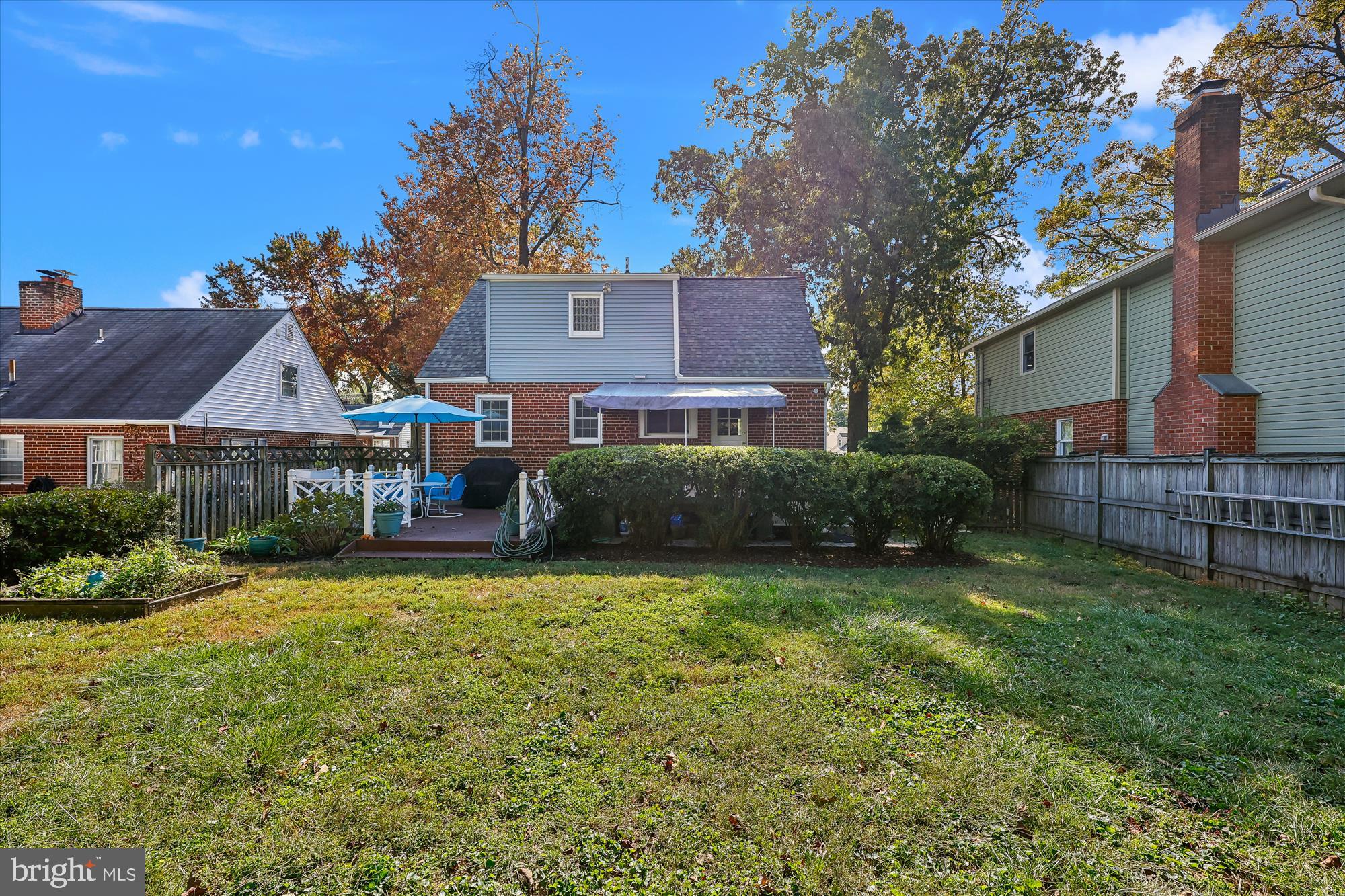 1605 Windham Lane Silver Spring, MD 20902 - Photo 29 of 65 a view of a house with a yard and tree s