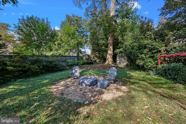 a work room with furniture and gym equipment