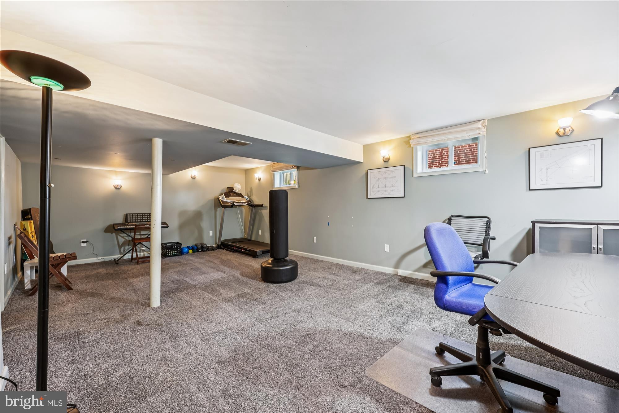 1605 Windham Lane Silver Spring, MD 20902 - Photo 35 of 65 a view of a livingroom with furniture and gym equipment