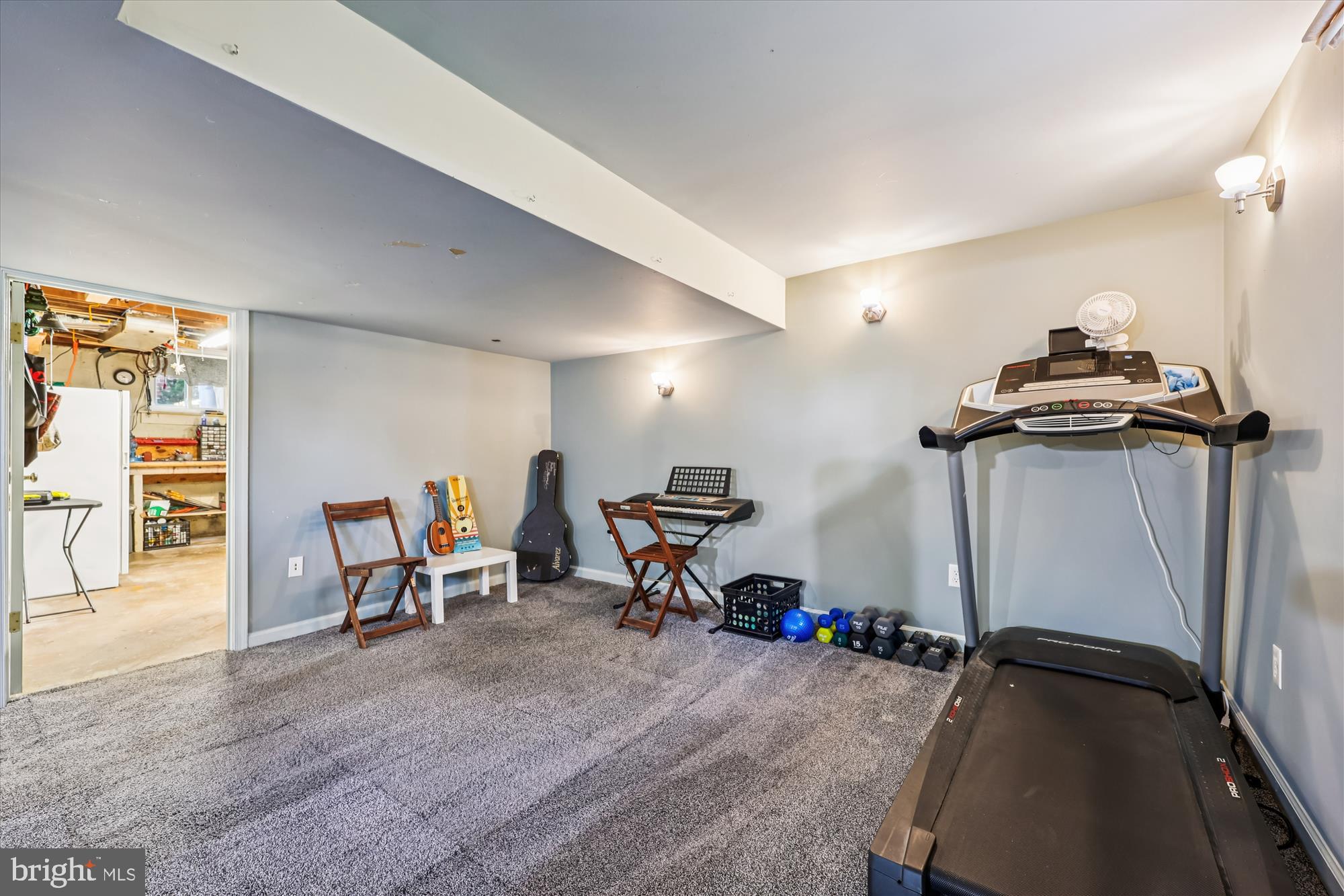 1605 Windham Lane Silver Spring, MD 20902 - Photo 39 of 65 a view of a room with gym equipment