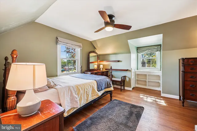 a view of a deck with furniture and umbrella
