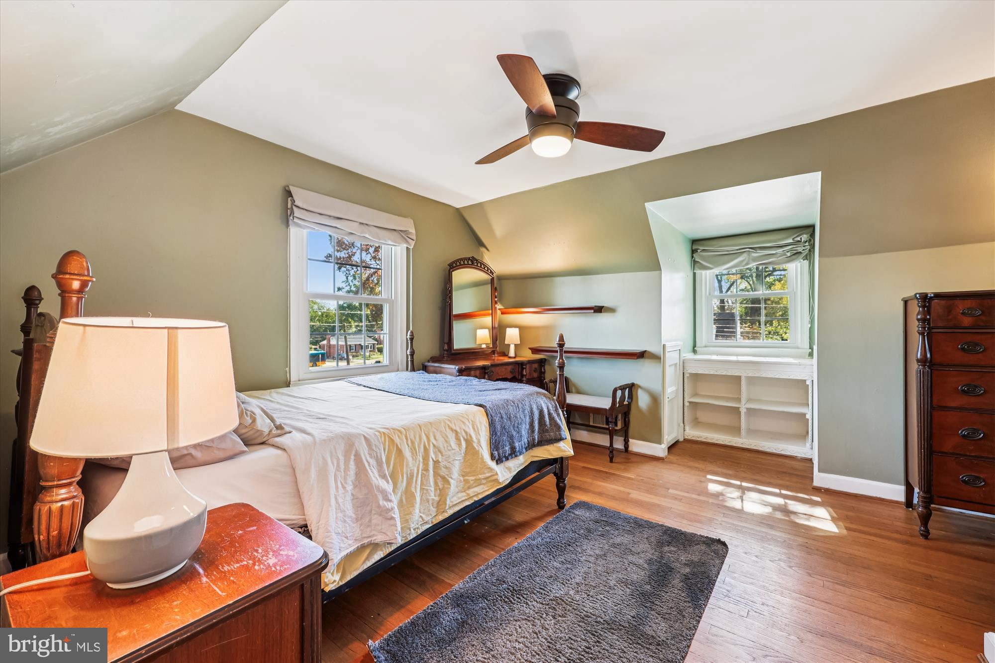 1605 Windham Lane Silver Spring, MD 20902 - Photo 43 of 65 a bedroom with a bed and wooden floor